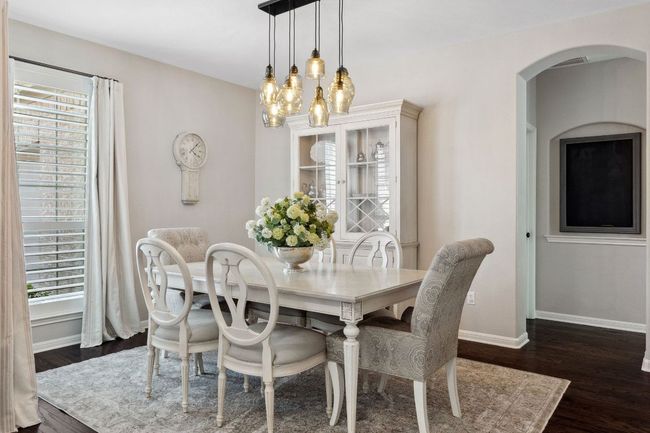 To the left of the entry foyer you will find this elegant formal dining room. | Image 16