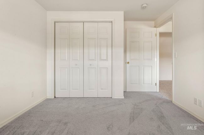 Unfurnished bedroom featuring carpet and a closet | Image 24