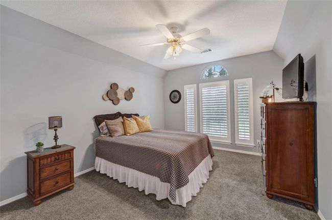 One of three secondary bedrooms upstairs. | Image 27