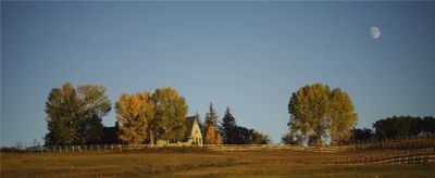 The main home is surrounded by trees and has great view of the ski mountain | Image 3