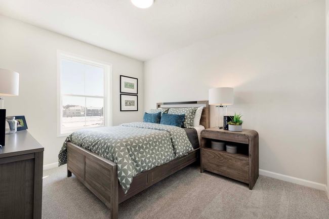 One of three upper level bedrooms (plus bedroom on main floor and lower level bedroom). | Image 16