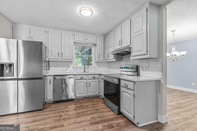 4617 Kingswood Dr, House other with 3 bedrooms, 2 bathrooms and 2 parking in Flowery Branch GA | Image 11
