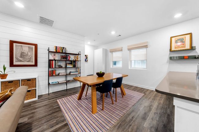 Dining room featuring visible vents, recessed lighting, and dark wood-style flooring | Image 9