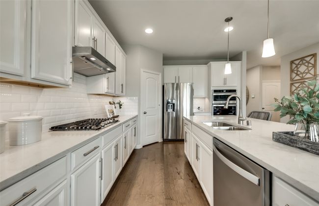 Spacious kitchen *Photos of furnished model. Not actual home. Representative of floor plan. Some options and features may vary | Image 6