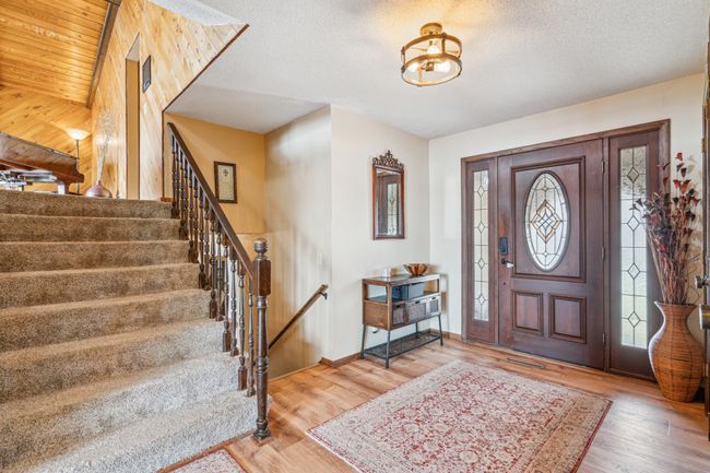 Welcoming main level foyer filled with natural light. | Image 5