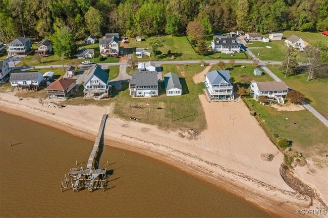 Birds eye view of property with a residential view and a water view. | Image 33