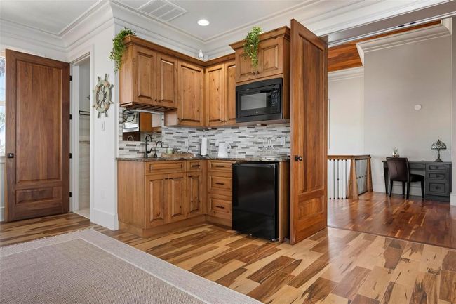 Guest bath and coffee bar in second bedroom suite | Image 54