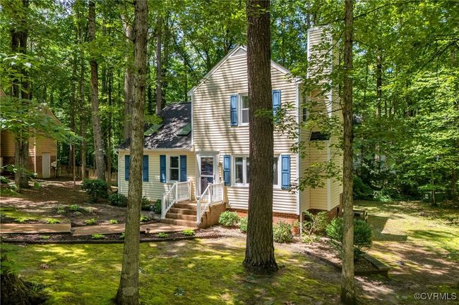 View of front of property featuring a chimney | Image 4