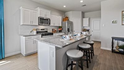 Kitchen - All Home and community information, including pricing, included features, terms, availability and amenities, are subject to change at any time without notice or obligation. All Drawings, pictures, photographs, video, square footages, floor plans, elevations, features, colors and sizes are approximate for illustration purposes only and will vary from the homes as built. | Image 2