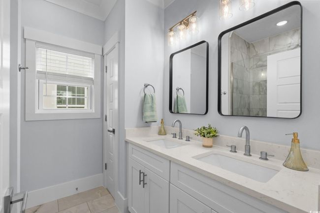 Full bathroom with double vanity and light tile patterned flooring | Image 23