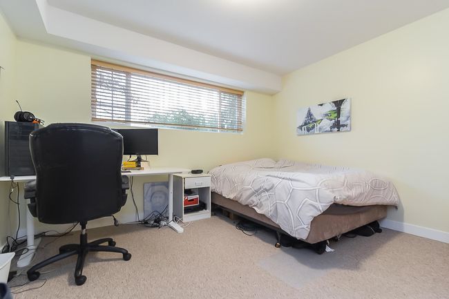 Bedroom with carpet floors | Image 24
