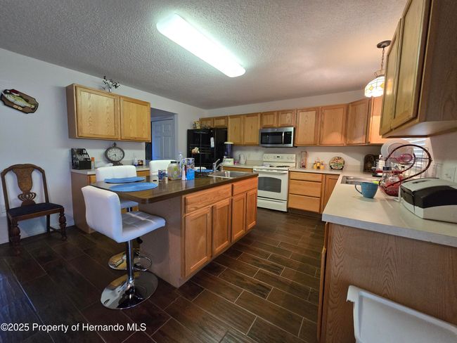 9276 Elm Ct, House other with 6 bedrooms, 5 bathrooms and null parking in SPRING HILL FL | Image 5