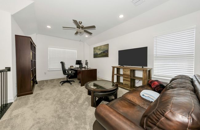 Office space featuring recessed lighting, visible vents, a ceiling fan, baseboards, and light colored carpet | Image 19