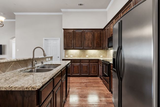 Granite countertops and refrigerator to convey. | Image 8