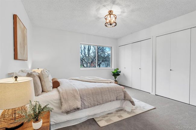 Primary bedroom with seasonal mountain views and plenty of closet space | Image 18