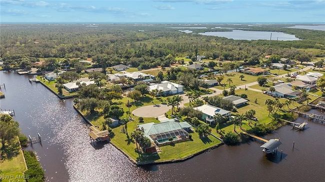 Bird's eye view with a water view, a residential view, and a wooded view | Image 21