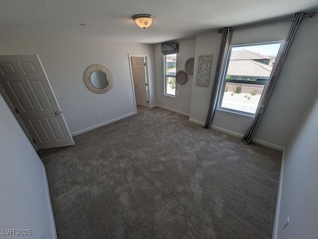 Carpeted empty room with baseboards | Image 29