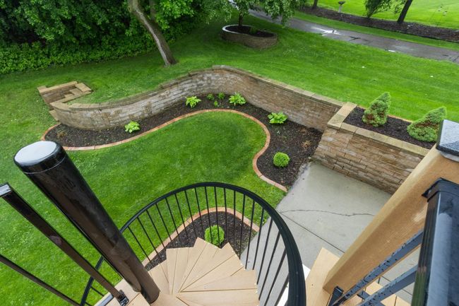 Lower level patio and beautiful landscaping | Image 9