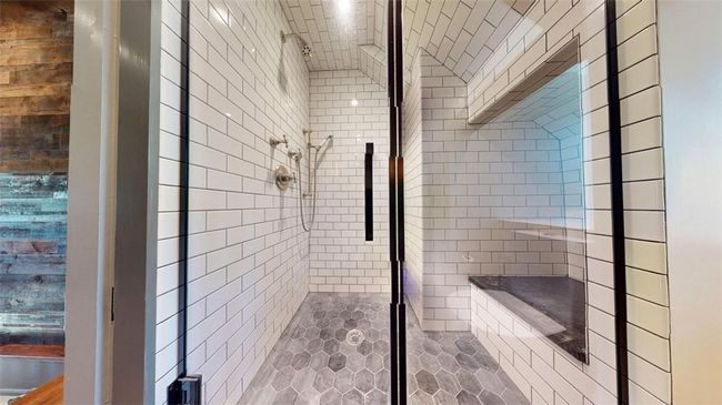 Bathroom with a shower with shower door | Image 32