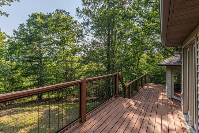 Back deck w/ access to and from primary-suite | Image 17