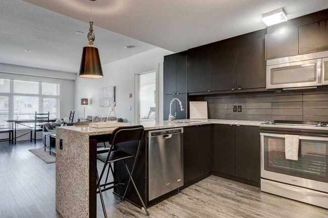 104 - 15 Aspenmont Heights Sw, Home with 2 bedrooms, 2 bathrooms and 1 parking in Calgary AB | Image 6