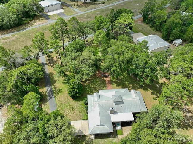 7802 Fairwind Loop, House other with 3 bedrooms, 2 bathrooms and 2 parking in Hernando FL | Image 44