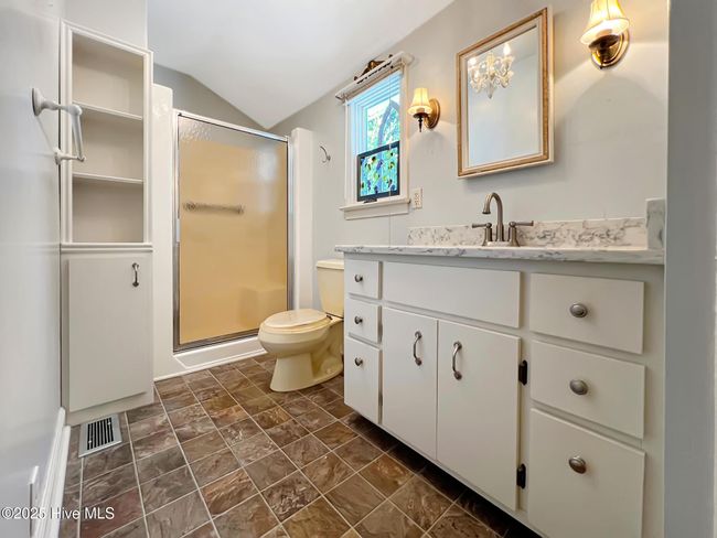 Full bath with shower and great storage | Image 19