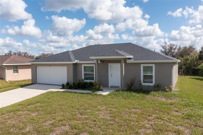 148 Flanders Street, House other with 3 bedrooms, 2 bathrooms and null parking in Port Charlotte FL | Image 2