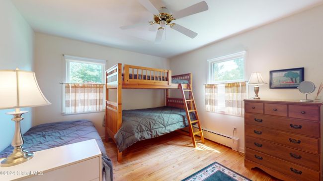 8 Sunrise Ct, House other with 3 bedrooms, 2 bathrooms and 6 parking in Silver Bay NY | Image 5