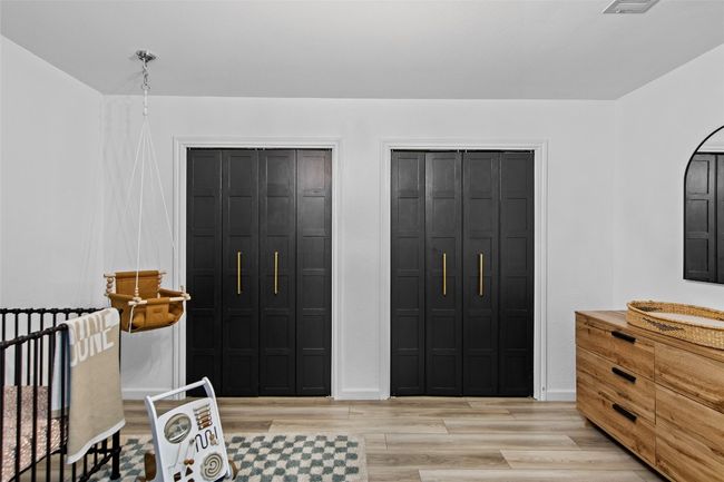 Bedroom with multiple closets. | Image 20
