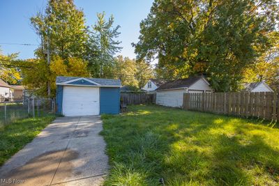 View of yard featuring a garage | Image 3