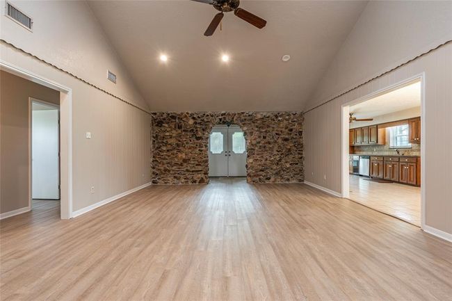 Vinyl floors in the living area for the main house | Image 7