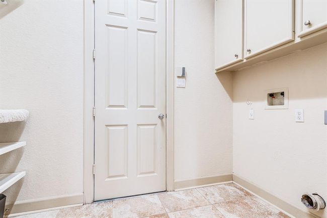 Mud room, laundry area with garage access. Great for bringing shopping and groceries into kitchen. extra storage here for cleaning supplies and bulk items. | Image 32