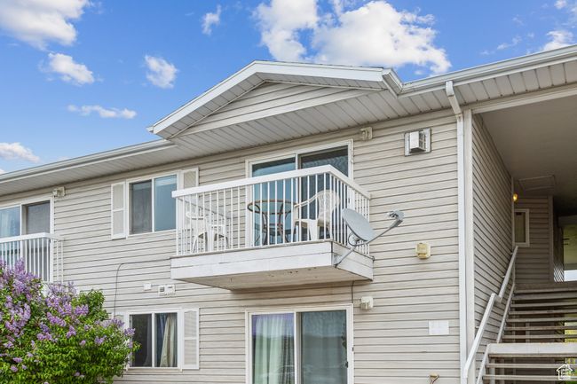 View of home's exterior featuring a balcony | Image 19