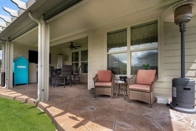 View of patio / terrace with ceiling fan and outdoor dining area | Image 21