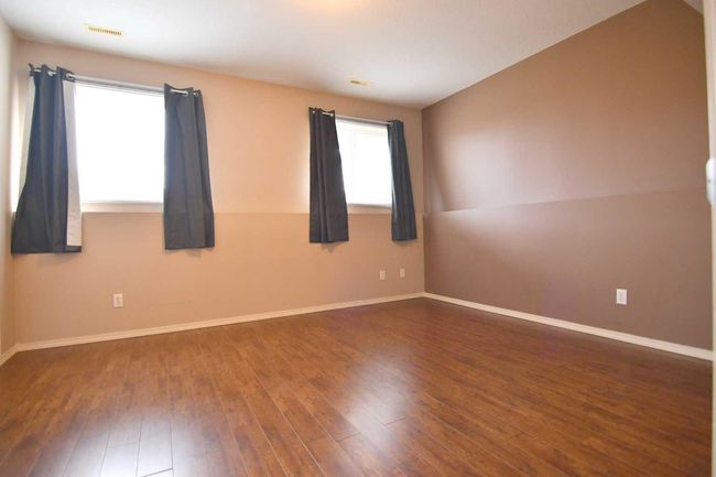 49 Prairie Ridge Close, Townhouse with 2 bedrooms, 2 bathrooms and 3 parking in Blackfalds AB | Image 18