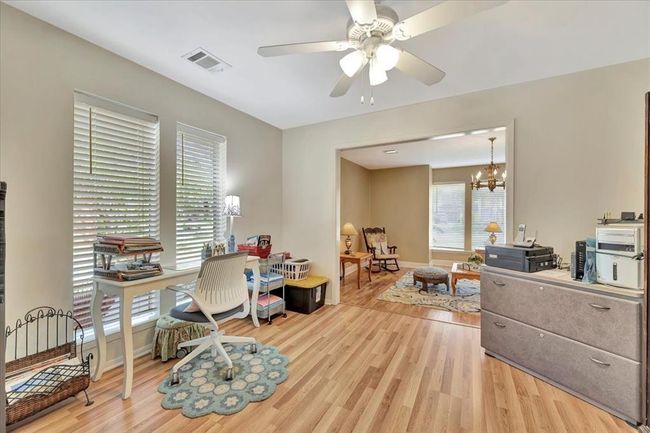 This is the formal dining room that the seller currently uses as an office space. | Image 26