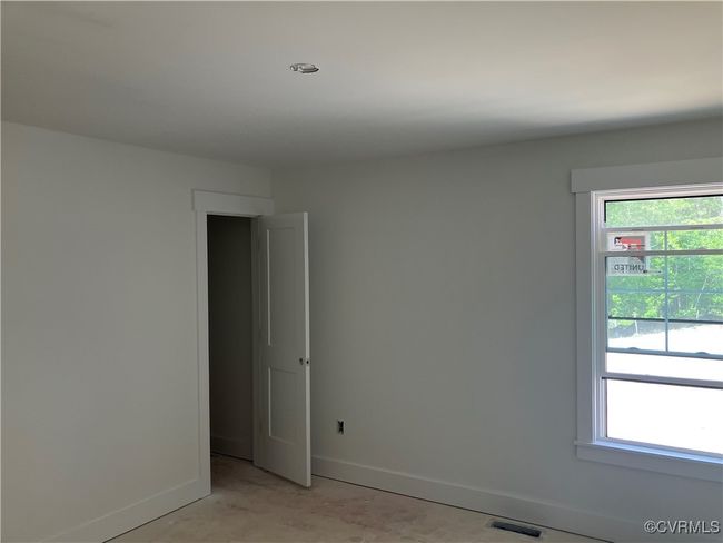 Empty room featuring baseboards and healthy amount of natural light | Image 20