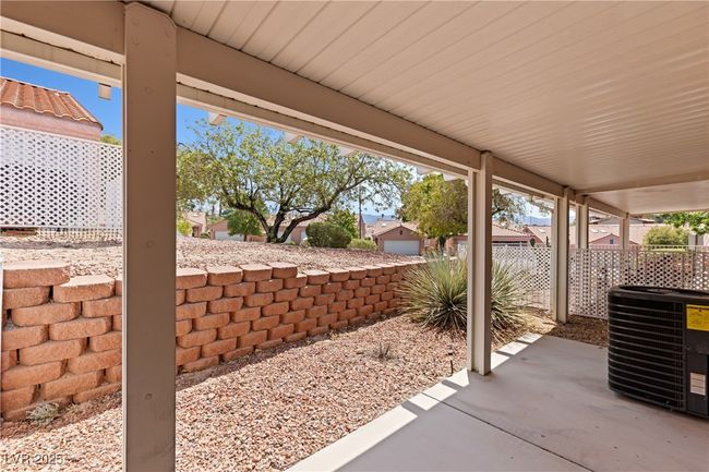 View of fenced backyard | Image 24