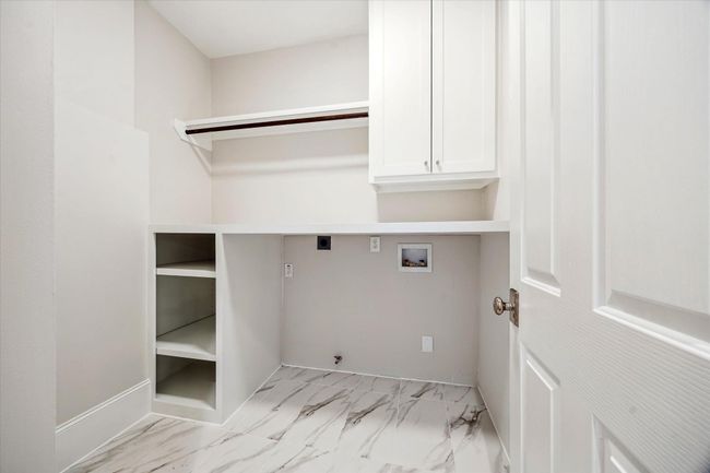 Utility room on first floor with lots of storage | Image 27