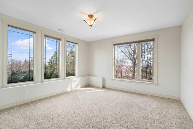 104 Grizzly Rise, House other with 6 bedrooms, 5 bathrooms and null parking in Cochrane AB | Image 31