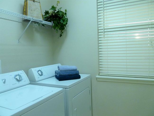 Laundry With Window Washer And Dryer Stay | Image 10