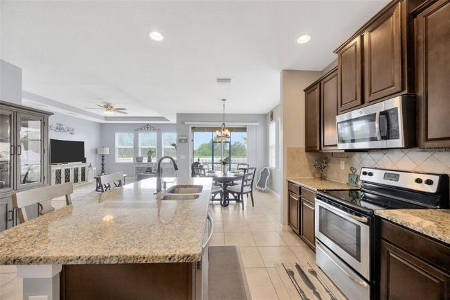 5624 Fisher Glen Loop, House other with 4 bedrooms, 4 bathrooms and null parking in WESLEY CHAPEL FL | Image 12