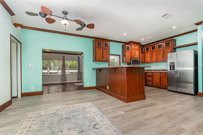 Open Kitchen w/ Cherry Wood Cabinets | Image 7