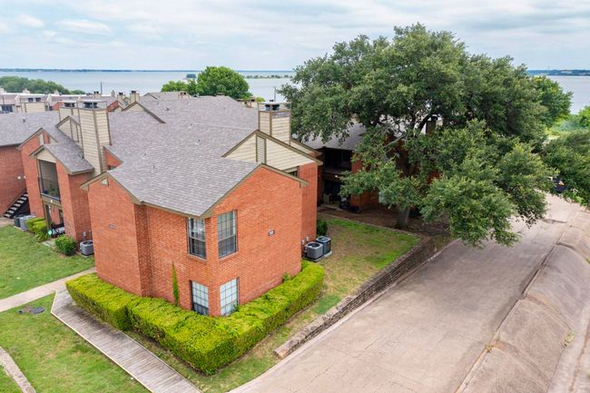 View from above of property with a nearby body of water | Image 31