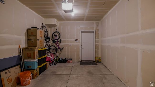 Garage featuring a garage door opener | Image 32