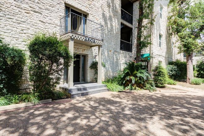 Doorway to property featuring stone siding | Image 22
