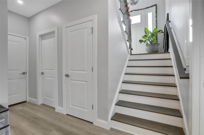 Staircase with hardwood / wood-style flooring | Image 23