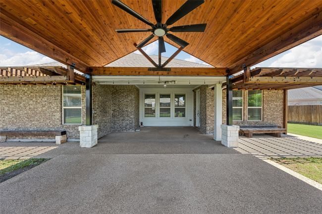 View of patio / terrace with a ceiling fan | Image 32