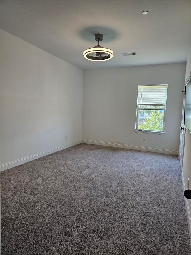 Empty room with carpet floors | Image 13